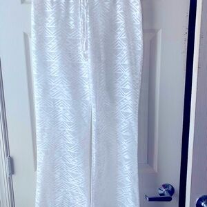 Woman’s white Lace pants size LG